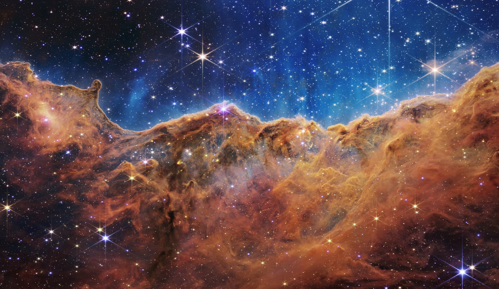 Cosmic Cliffs in the Carina Nebula, photographed by the James Webb Space Telescope